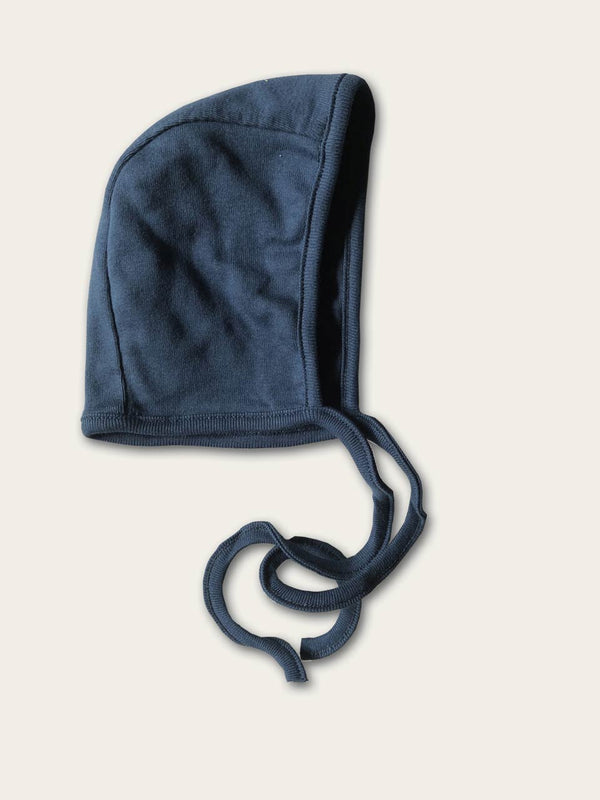 Navy blue baby bonnet with tie strings