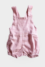 Light pink overalls on a light grey background