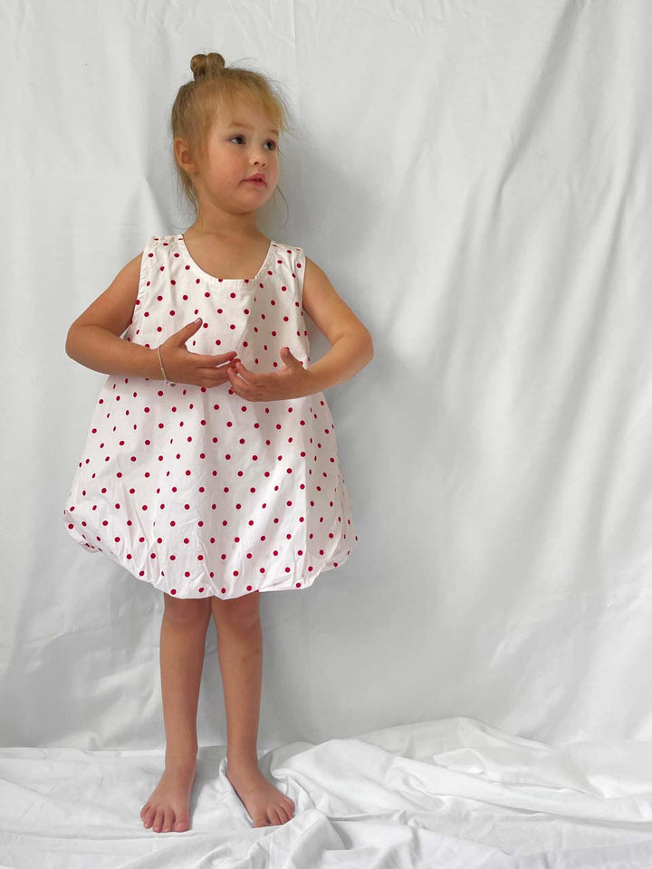 Red Polka Dot dress with open back and bloomers modelled