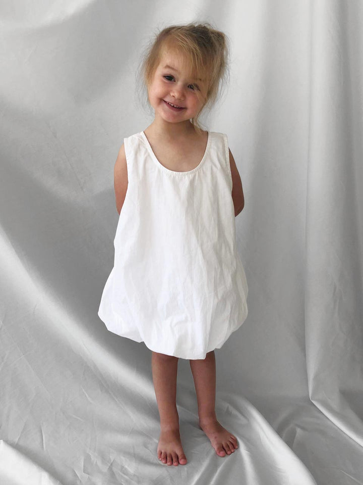 White dress and bloomers modelled