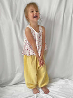 Happy pants in lemon modelled