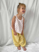 Happy pants in lemon modelled