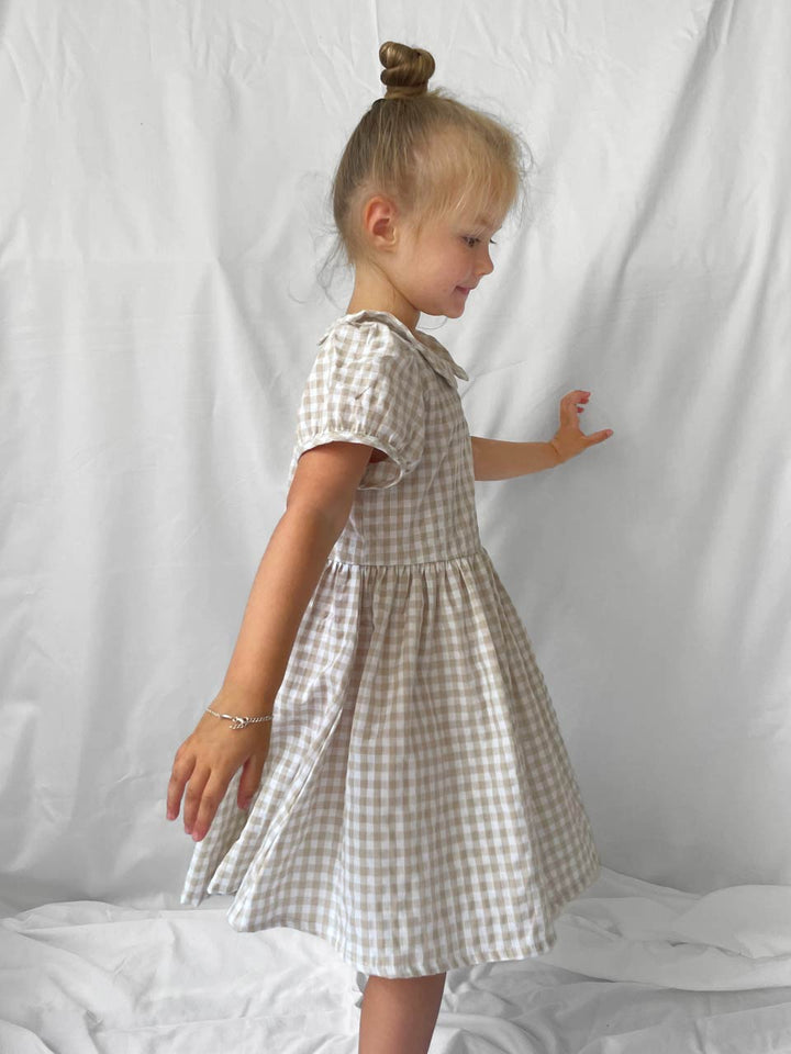 Caramel gingham dress modelled side view