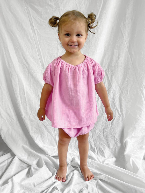 Pink short sleeve top and bloomers modelled