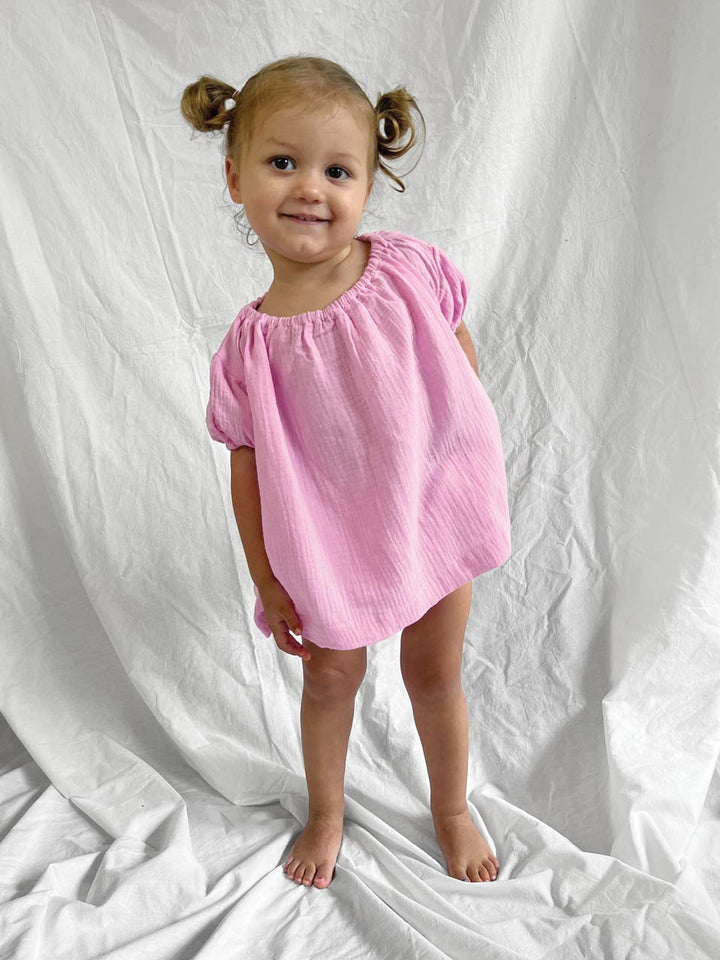 Pink short sleeve top and bloomers modelled