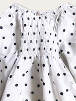 Romper smocked with long sleeves in polka dot neck line