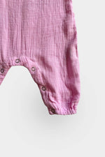 Baby jumpsuit sleeveless in pink leg snaps view