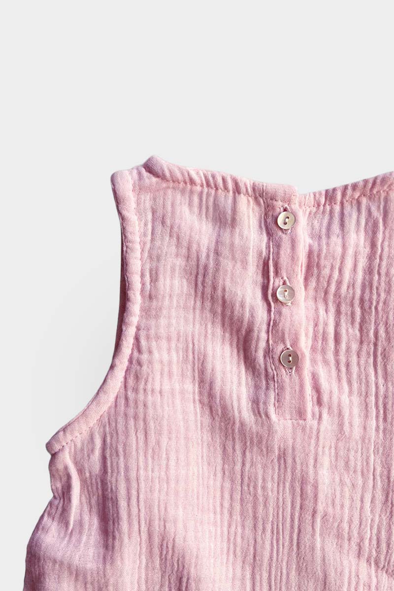 Baby jumpsuit sleeveless in light pink back button up