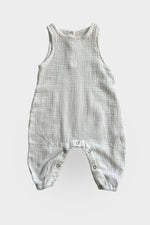 Baby jumpsuit sleeveless in white front view