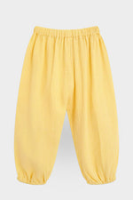 Yellow pants back on a light gray background