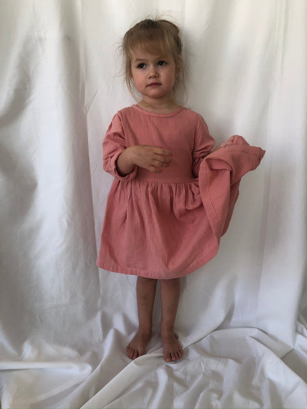 Pink long sleeve dress modelled