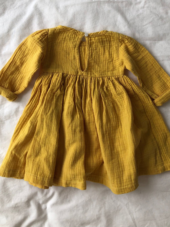 Yellow long sleeve dress back